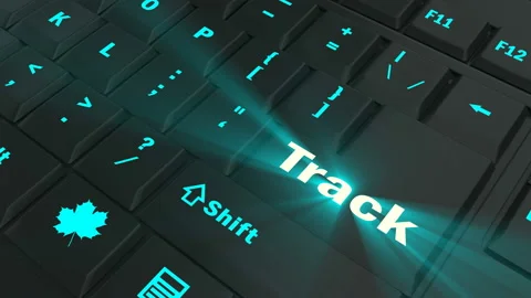 Pointing on blue glowing Track key Stock Footage 100637462