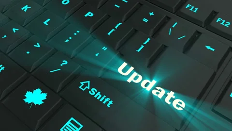 Pointing on blue glowing Update key Stock Footage 100562448
