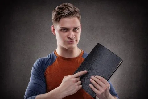 Pointing to the book Stock Photos