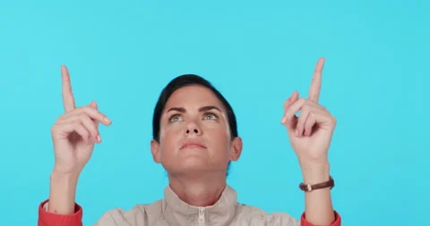 Pointing up, confused and thinking with face of woman in studio for presentation Video stock 245134942
