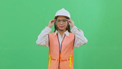 Pointing at Eyes Use Goggles Reminder Female Safety Officer Stock Footage 331971142