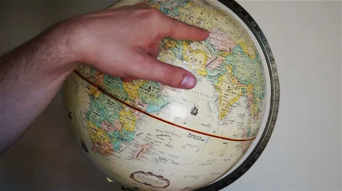 Pointing at Globe Stock Footage 25827300