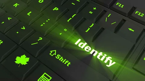 Pointing on green glowing Identify key Stock Footage 100582312