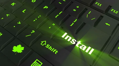 Pointing on green glowing Install key Stock Footage 100561937