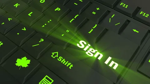 Pointing on green glowing Sign In key Stock Footage 100609103