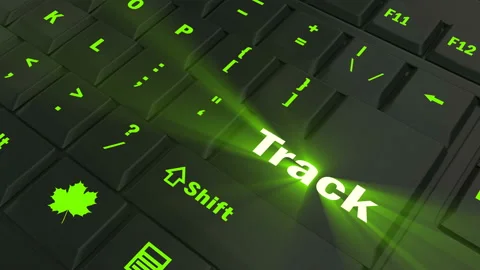 Pointing on green glowing Track key Stock Footage 100637463
