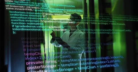 Pointing at holographic code, mature Korean man in white lab coat holding tablet Stock Photos