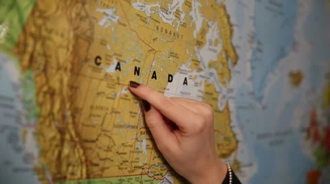 Pointing on a map of Canada Stock Footage 45880570