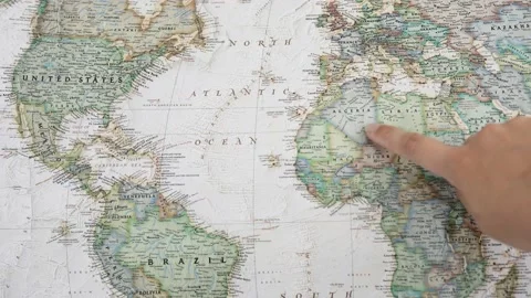 Pointing on a map Stock Footage 130399843