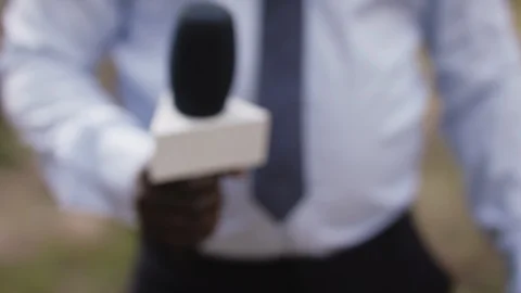 Pointing microphone to the camera. Inter... | Stock Video | Pond5