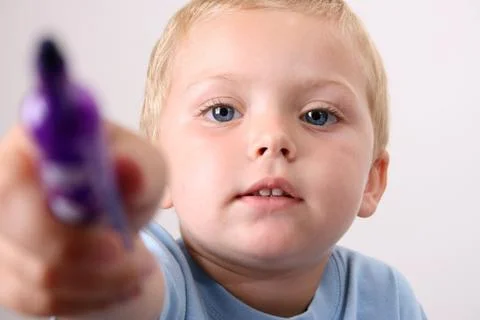 Pointing pen to camera Stock-Fotos