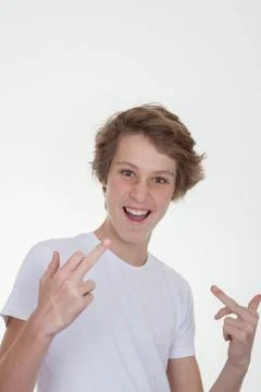 Pointing at self or face Stock Photos