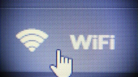 Pointing on Wifi icon on computer display. Wifi communication data transfer Video stock 111447026