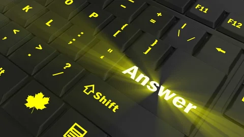 Pointing on yellow glowing Answer key Stock Footage 100607261