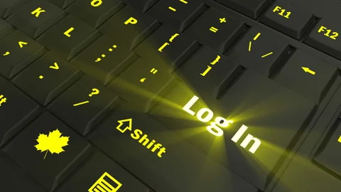 Pointing on yellow glowing Log In key Stock Footage 100608171