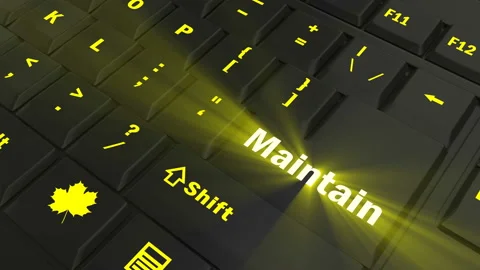 Pointing on yellow glowing Maintain key Stock Footage 100608238
