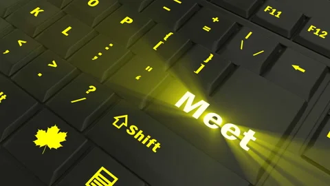 Pointing on yellow glowing Meet key Stock Footage 100608330