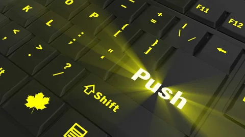 Pointing on yellow glowing Push key Vídeos de archivo 100608761