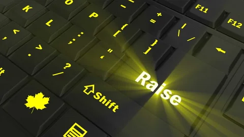 Pointing on yellow glowing Raise key Stock Footage 100637120