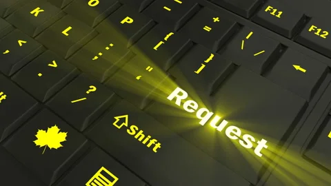 Pointing on yellow glowing Request key Stock Footage 100582867