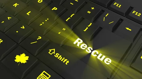 Pointing on yellow glowing Rescue key Stock Footage 100582973