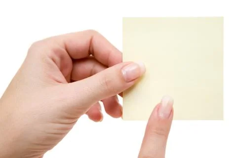 Pointing at a Yellow Post-it Isolated on a White Background Photos