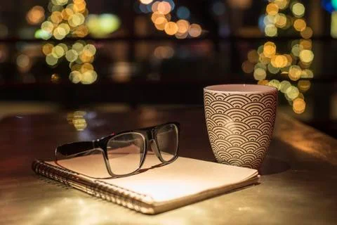Points notebook and cup of coffee Stock Photos
