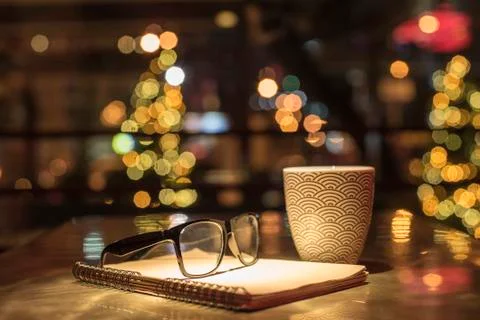 Points notebook and cup of coffee Stock Photos