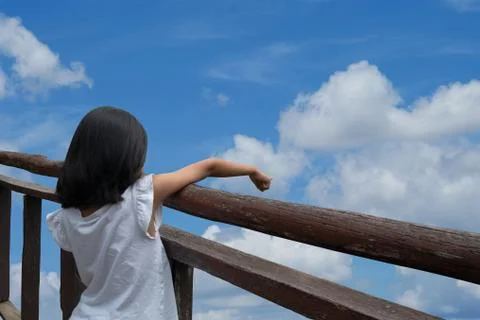 Pointting clouds on the blue sky Stock Photos