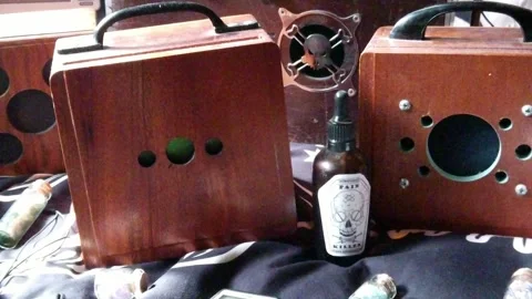 Poison bottle between collection of paranormal spirit and ghost box Stock Footage 247607286