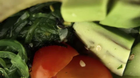 Poke with Avocado, cherry tomatoes, Chuca seaweed. Stock Footage 156540369