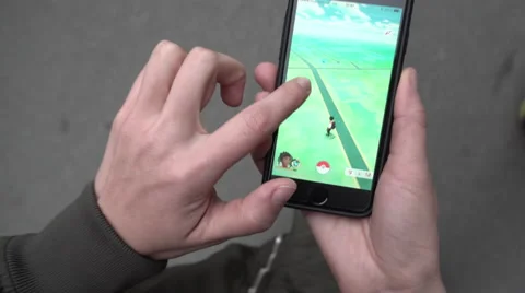 Pokemon go Application Game on Mobile Smartphone Stock Footage 68535453