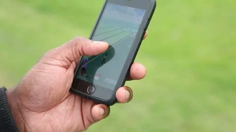 Pokemon Go in Park Video stock 66509184