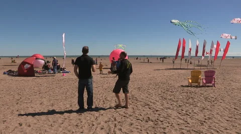 Pokemon GO themed kite flying festival on Toronto beaches Stock Footage