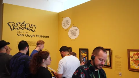 Pokemon wall and visitors at the van Gogh museum. Amsterdam, Netherlands. Stock Footage 255447745