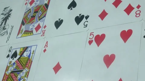 Poker cards in a game on the table Stock Footage 89545908