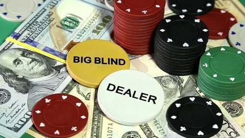 Poker chips and dollars on rotating surface. Video stock 73988899