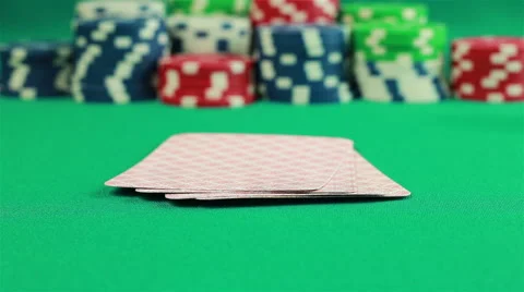 Poker Chips and Four Aces on green background Stock Footage 65478624