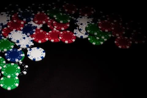 Poker Chips on dark background Stock Photos