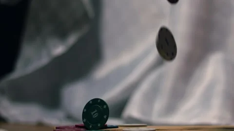 Poker chips falling to floor Stock Footage 320068926