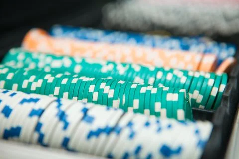 Poker Chips on a gaming table with dramatic lighting Fotos de archivo