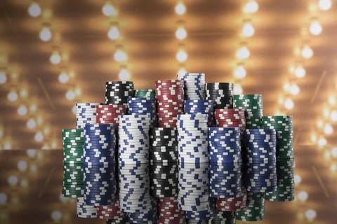 Poker Chips on gaming table Stock Photos