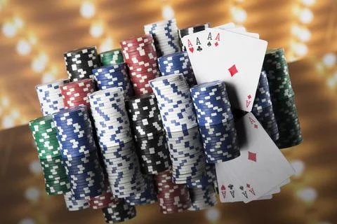 Poker Chips on gaming table Stock Photos