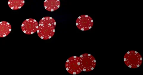 Poker chips in multiple colours dropped onto black Stock Footage 112341586