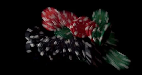 Poker chips in multiple colours splayed across black background Stock Footage 112333397