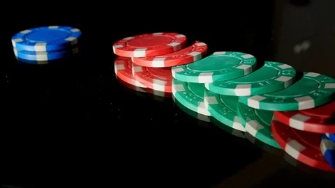Poker Chips Throw at Glass Table by Man in White Shirt Slow Motion Stock Footage 104050581