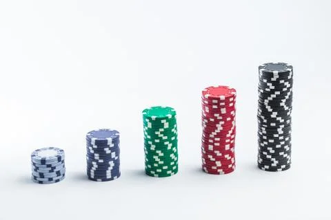 Poker chips on a white background different stacks of isolate Stock Photos