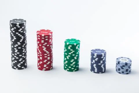 Poker chips on a white background different stacks of isolate Stock Photos