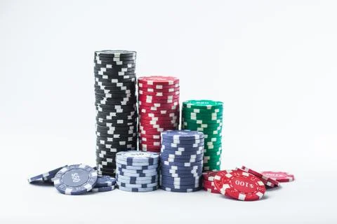 Poker chips on a white background different stacks of isolate Stock Photos