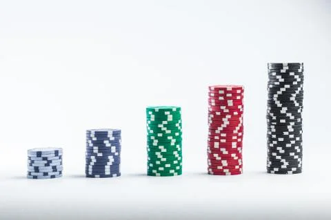 Poker chips on a white background different stacks Foto stock